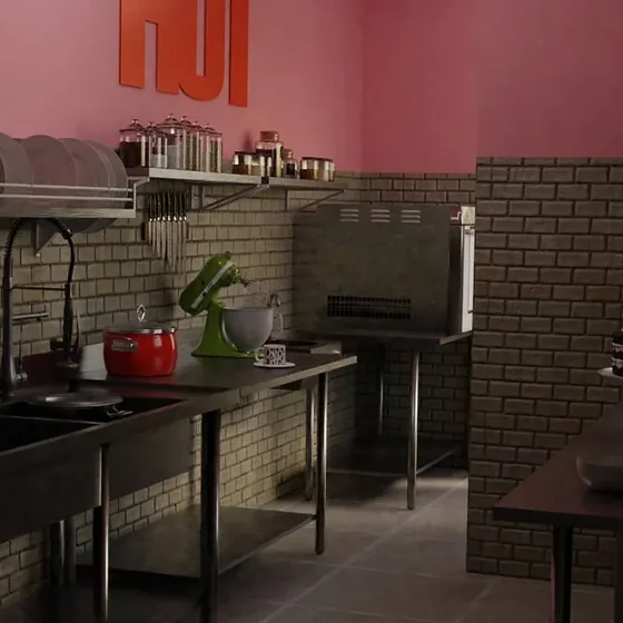 Cozinha industrial da Lins Brigadeiro, com bancadas de inox.