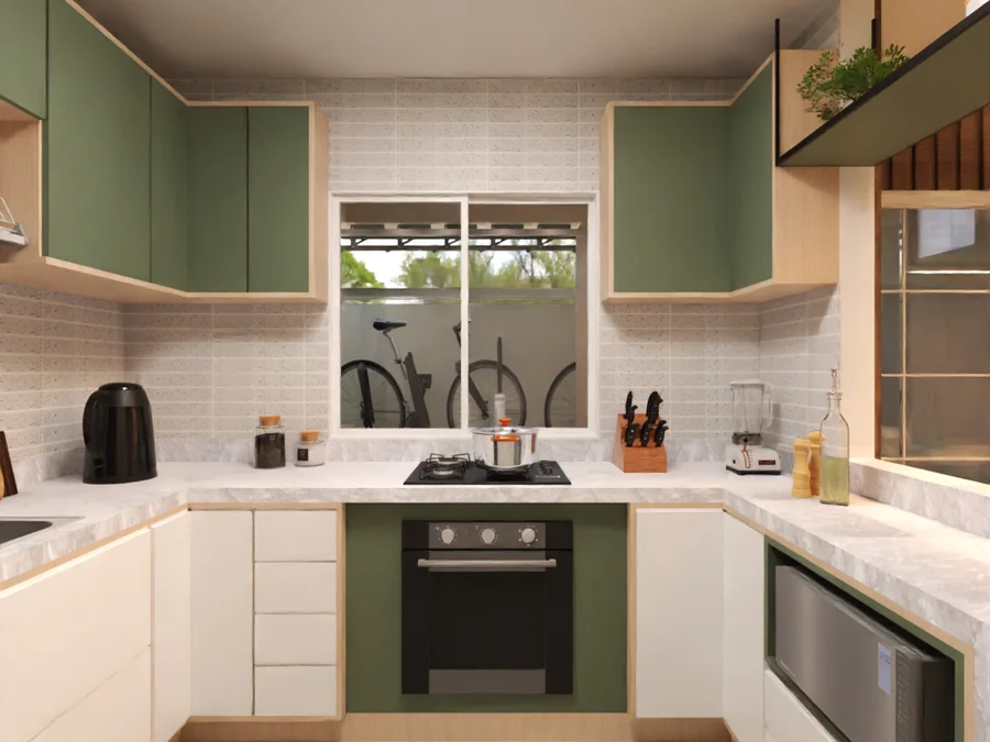 Cozinha em U com armários verdes e brancos, cooktop e bancada clara.